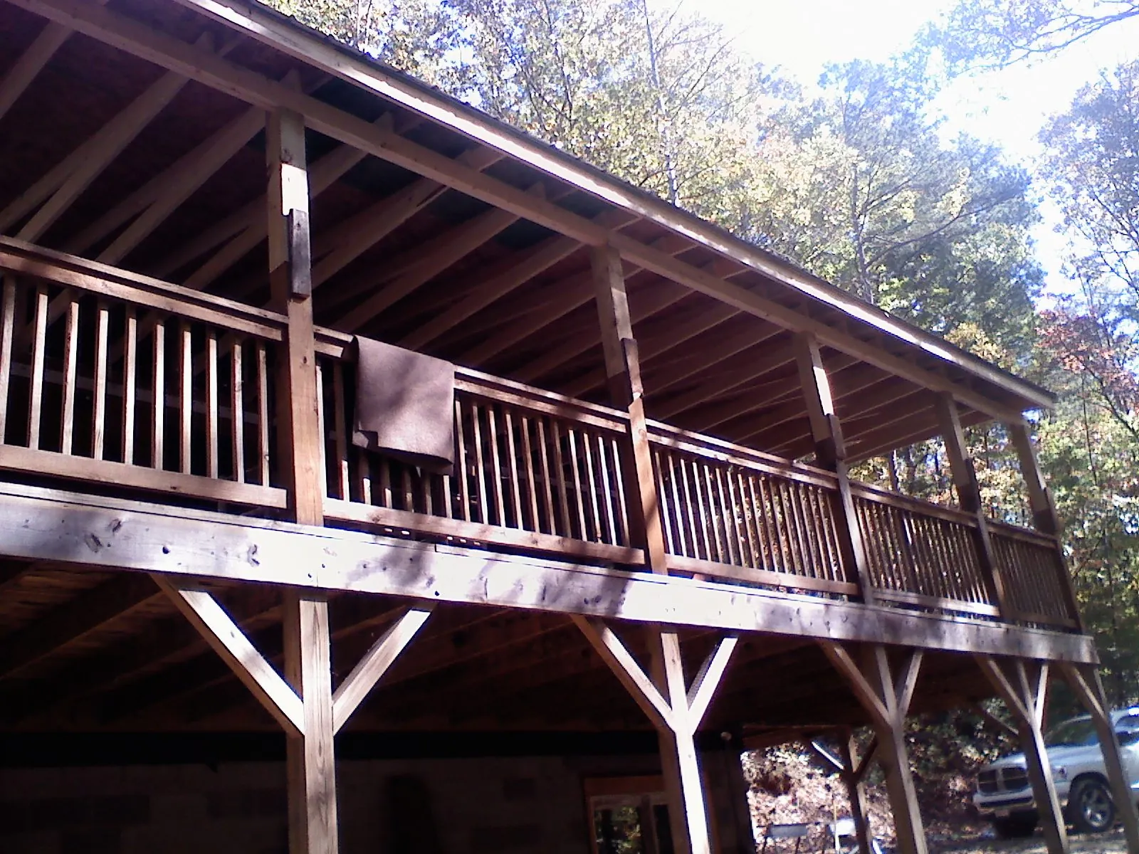 Timber framing under a new elevated porch and deck — Roof Leak Repair in Newkirk by Roofing Brothers